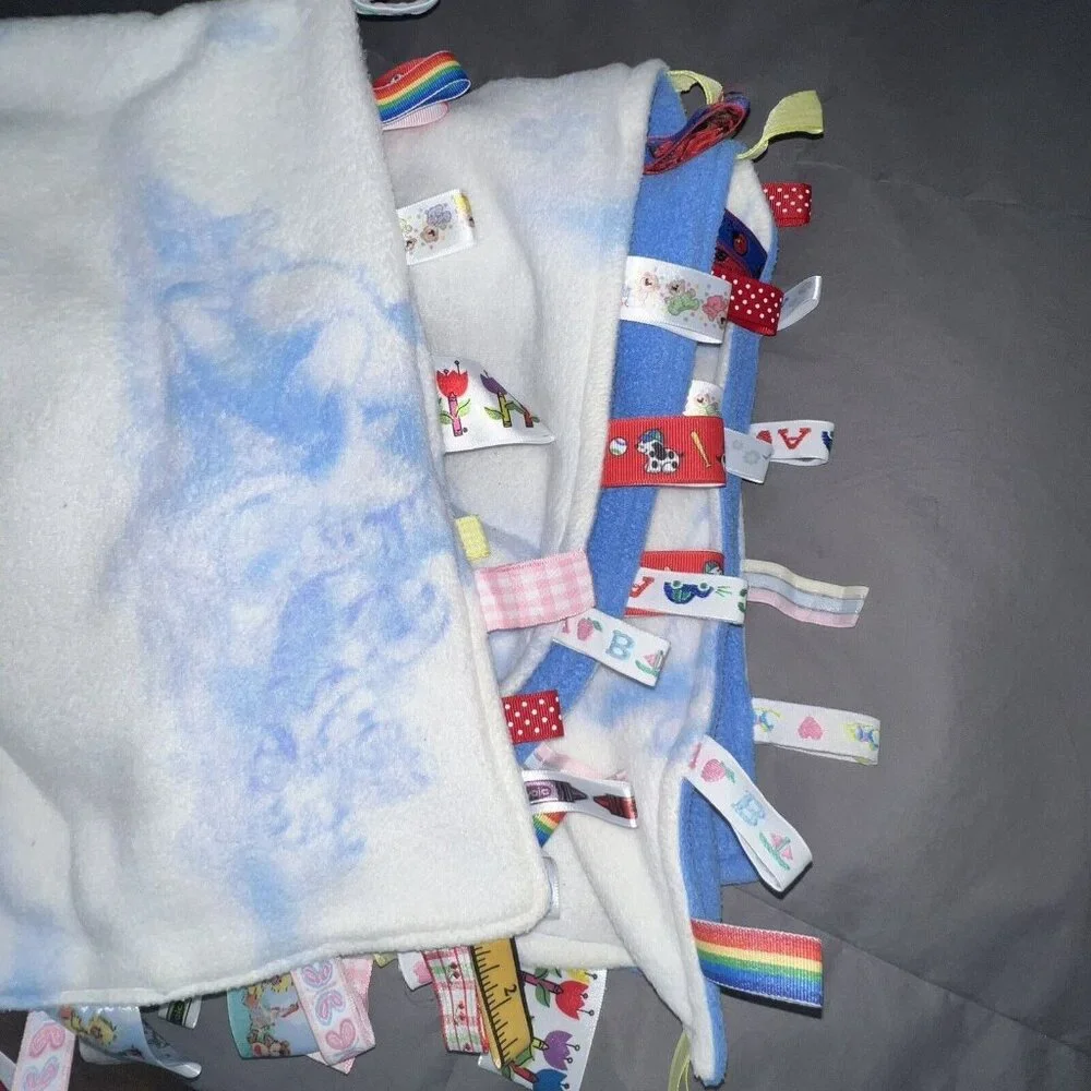 Winnie The Pooh And Friends Baby Blanket With Soothing Tabs Blue Size 31 X 49‎
